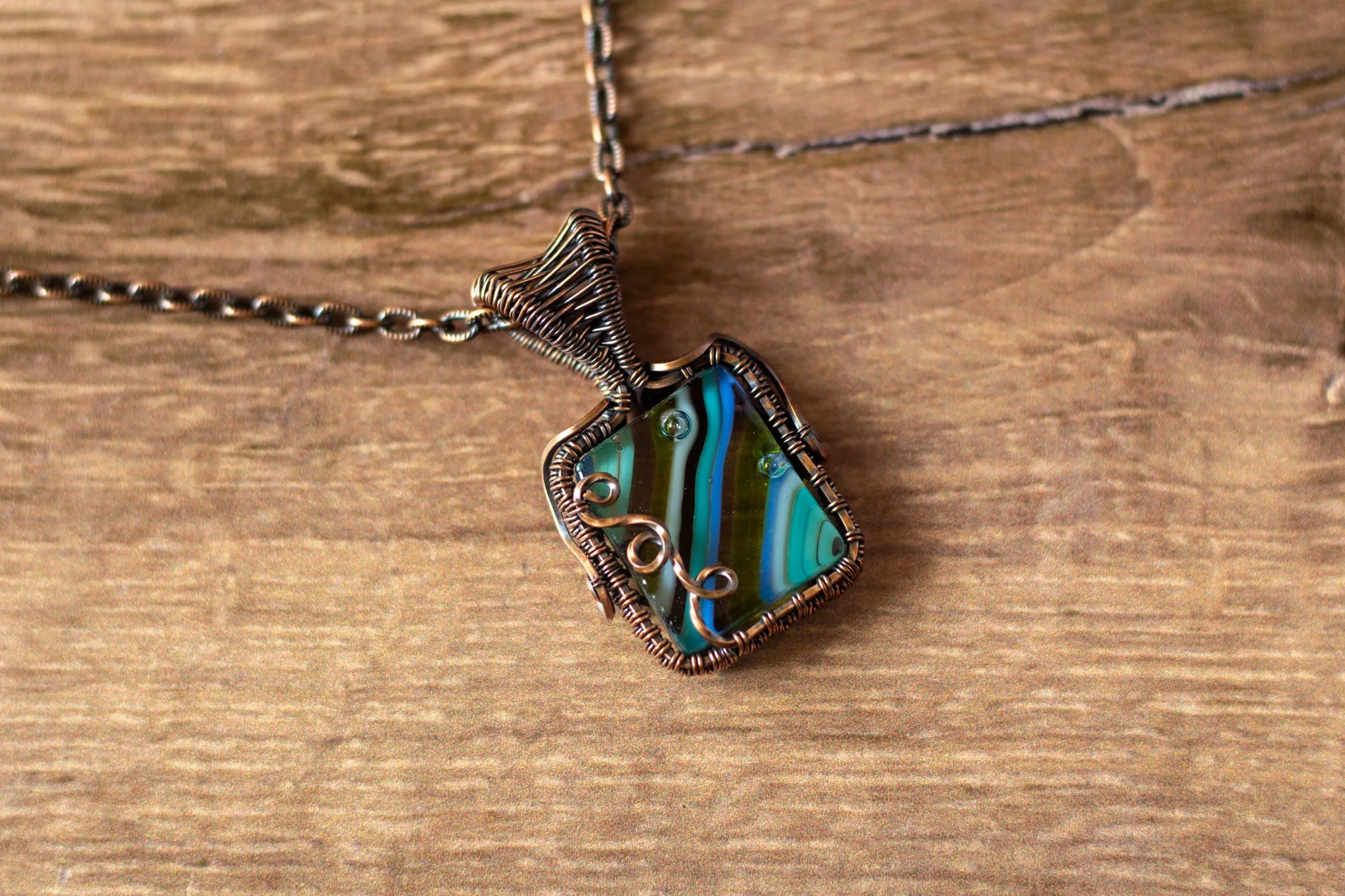 Striped Blue and Green Fused Glass Pendant with Copper Wire Wrapping