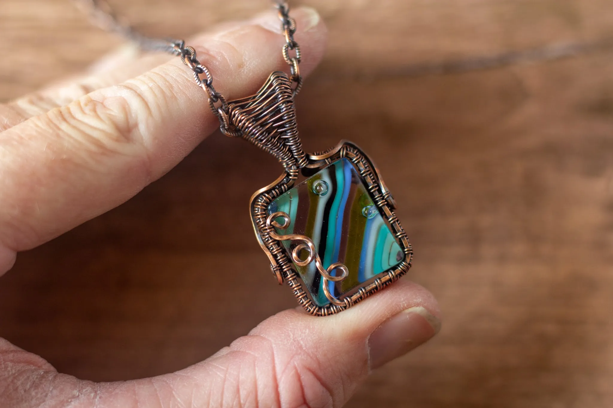 Striped Blue and Green Fused Glass Pendant with Copper Wire Wrapping