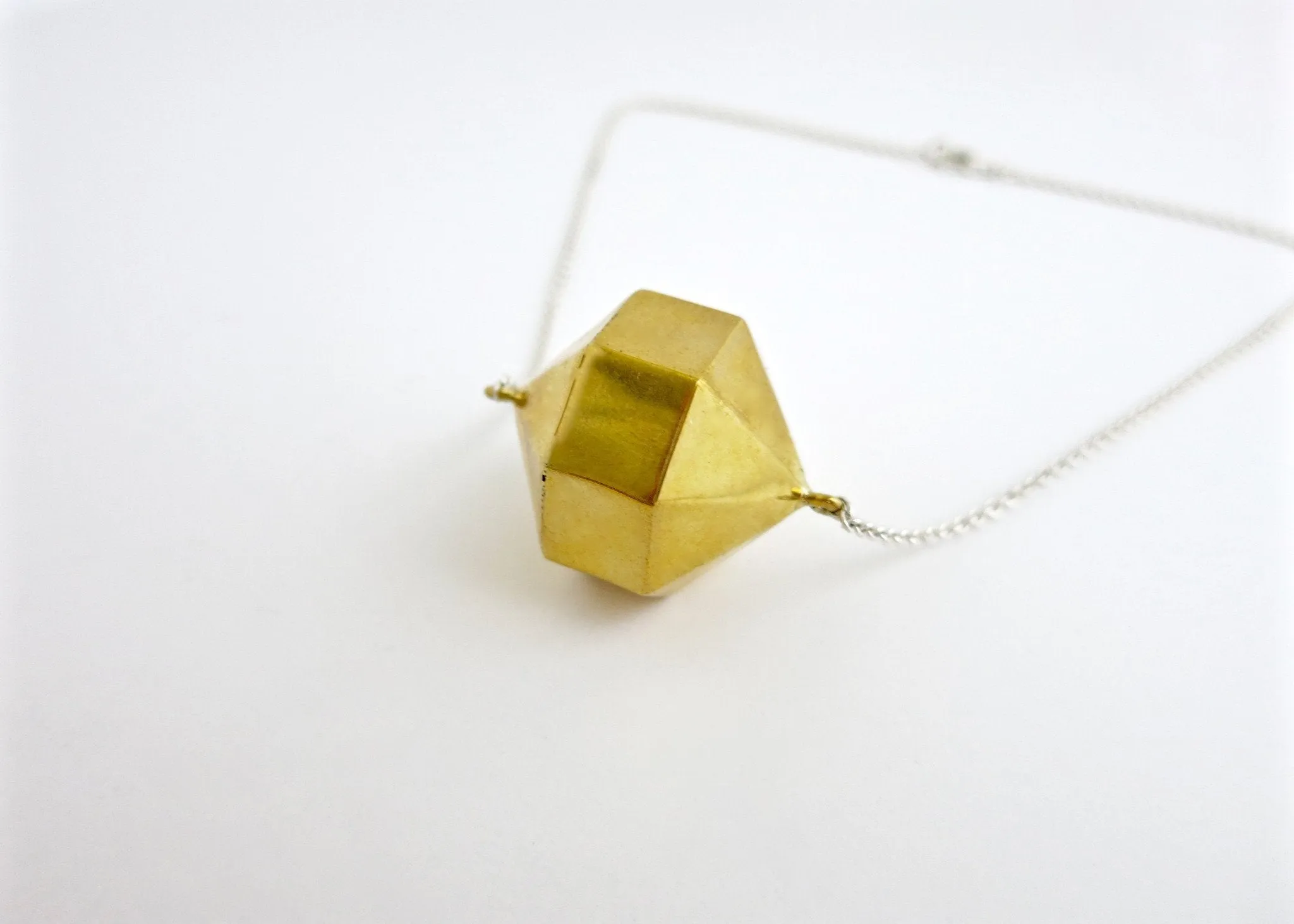 Super chic, minimalist, polygon locket in gold-plated brass with sterling silver chain