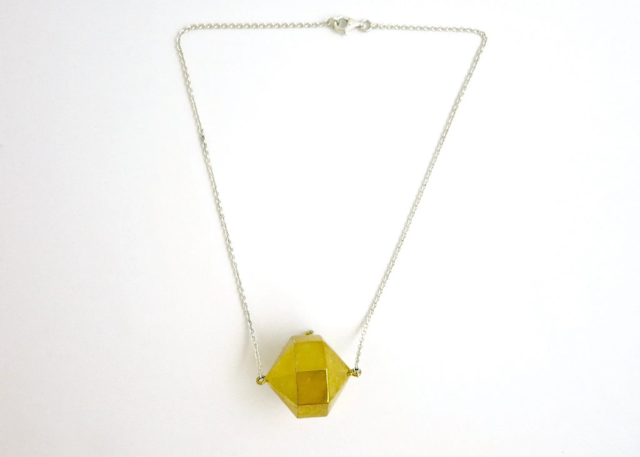 Super chic, minimalist, polygon locket in gold-plated brass with sterling silver chain